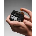 STMNT_Nomad_Classic_Pomade_100ml_4067971069920_Hand_texture_BeautyShot_Global.webp